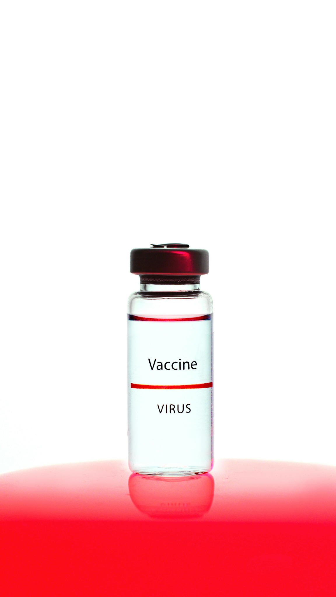 Clinical vaccine vial used to represent lab and diagnostic testing.